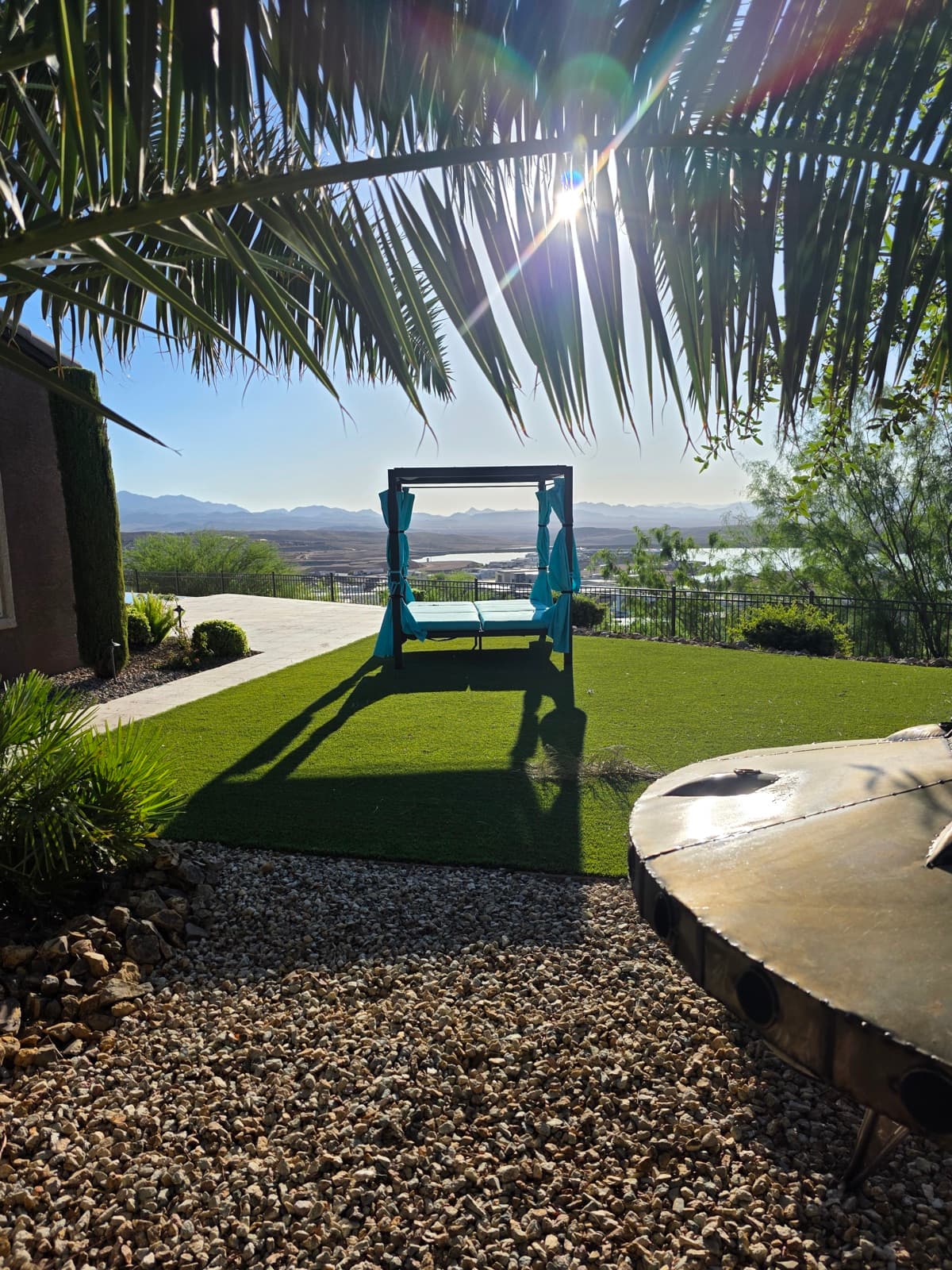 Artificial turf backyard with a putting green after treatment