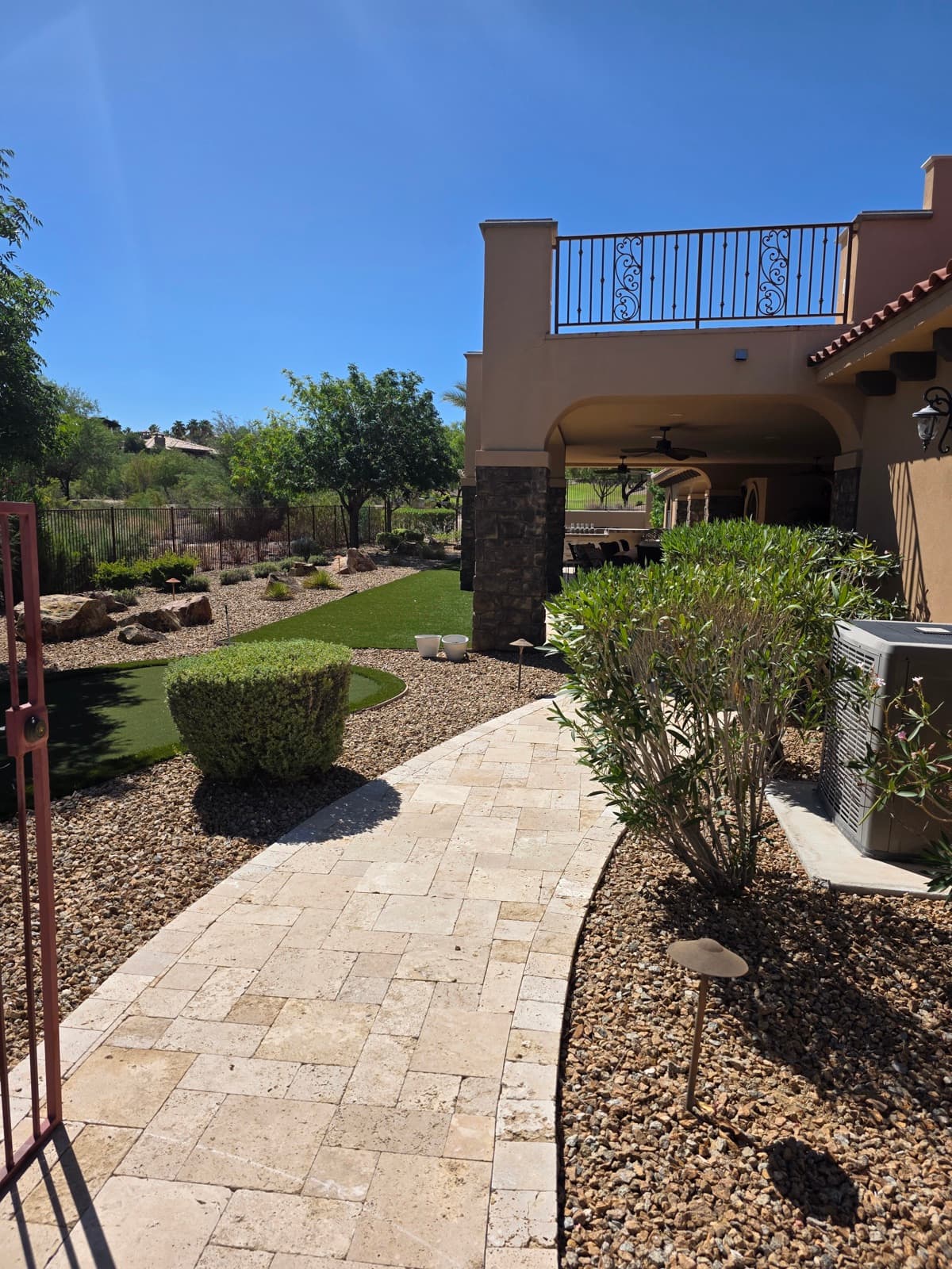 Landscaped walkway beside a Henderson home